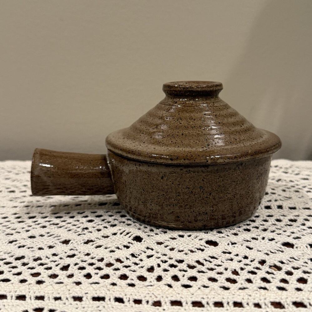 brown ceramic Stone Wave Microwave Cooker